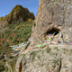 The entrance to Baishiya Karst Cave, with Buddhist ornamentation.